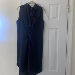 Blue dress made with polyester and 3% elastane.